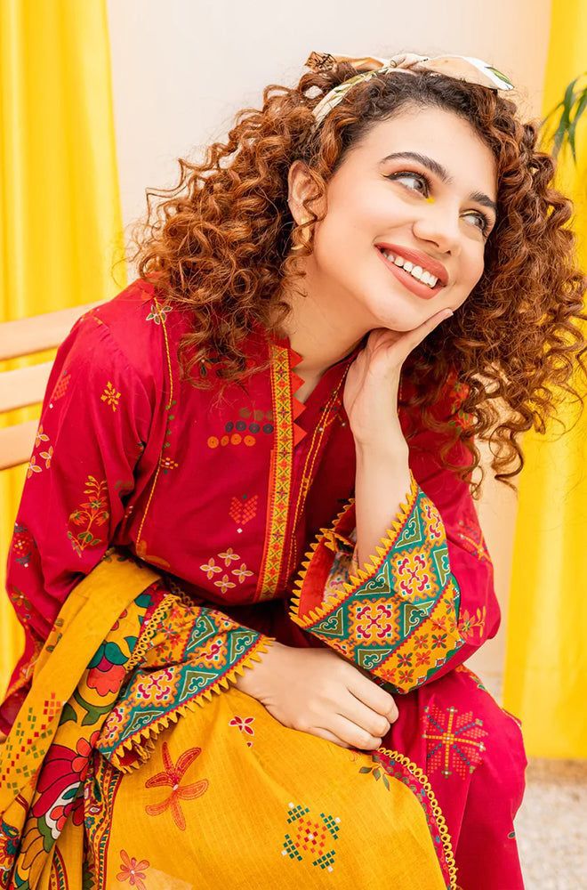  Elegant 3-piece embroidered lawn suit displayed with a beautifully printed dupatta, showcasing luxurious design and craftsmanship.