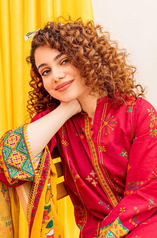 Luxurious 3-piece lawn suit featuring exquisite embroidery, accompanied by a stunning printed dupatta for an elegant ensemble.